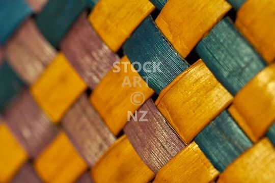 New Zealand flax weaving - purple, blue and yellow colours 
