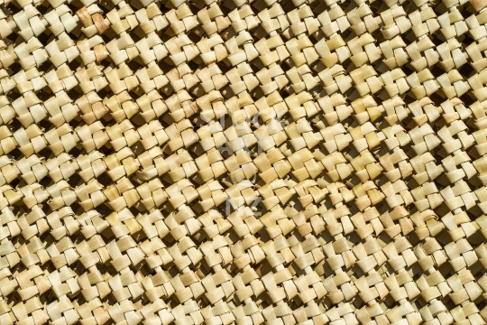 New Zealand flax weaving:  windmill knot