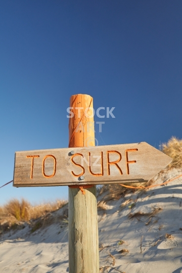 To Surf sign and radiant blue sky