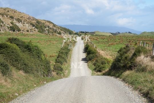 New Zealand landscapes - typical New Zealand country gravel road