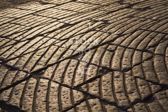 Ancient cobble stones with grooves