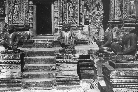 Banteay Srei temple, Angkor - Hanuman statues - Beautiful 10th century sandstone temple, carvings and statues around the central mandapa tower, located outside of Angkor Wat and probably the finest small temple of all - black & white vintage low resolution photo from March 1992