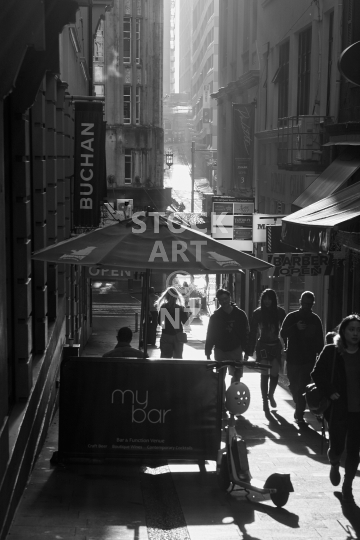 Black and white Auckland street scene - Narrow Durham Street in downtown Auckland with pedestrians