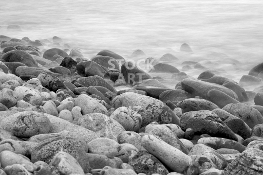 Boulder Bank rocks - Black & white photo of the stone beach in Nelson, New Zealand