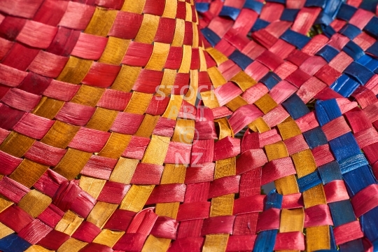 Closeup of a potae - New Zealand flax weaving  - Detailed picture of a very colourful handwoven hat, with property release