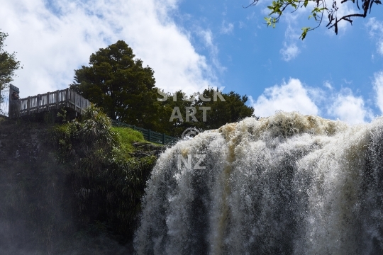 Closeup of Whangarei Falls from below - Lots of water flowing after heavy rain - Northland, New Zealand