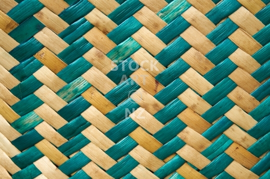 Flax weaving background - kete closeup - Detail of a turquoise and natural coloured bag with vertical twill weave