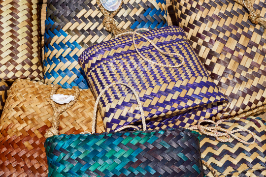 Flax weaving bags  - Background with beautiful woven New Zealand kete whakairo - with property release