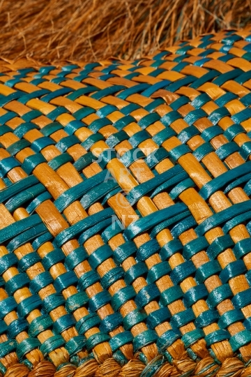 Flax weaving closeup - colourful kahu - Golden yellow and turquoise colours