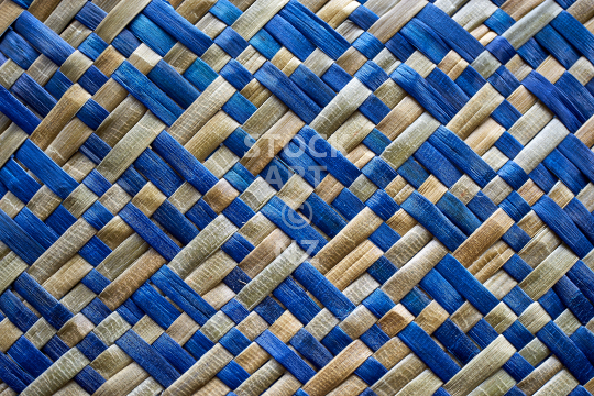 Flax weaving closeup of a kete whakairo - Background photo, detail of a patterned bag, with artist release