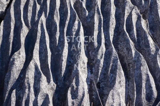 Fluted limestone rocks - background - Beautiful abstract karst rock formations along the Waipu Coastal Trail - Northland, New Zealand