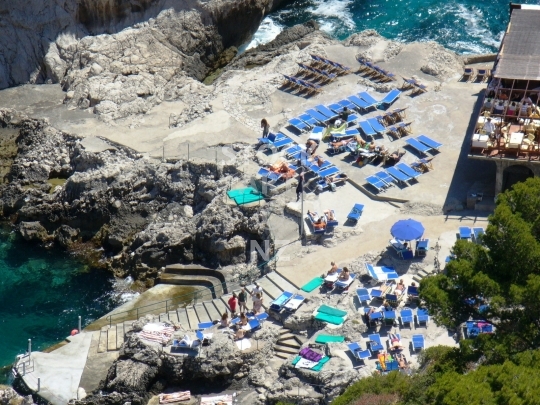 Fontelina beach at Punta Tragara in Capri