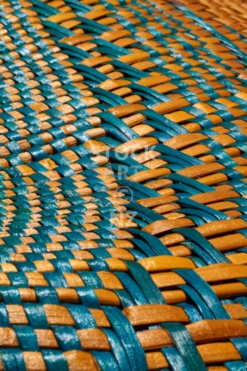 Golden yellow and turquoise flax weaving