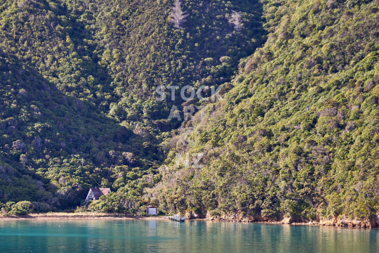 Hidden house in a Marlborough Sounds bay - View from the ferry between Wellington and Picton NZ