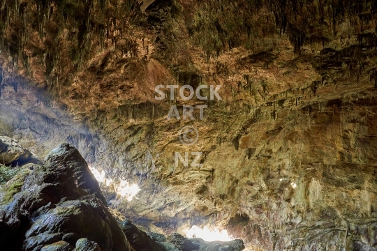 Inside Rawhiti cave - Takaka, Golden Bay, NZ - Interior of the beautiful limestone cave in Dry Creek Valley with stalactites and stalagmites 