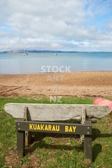 Kauakarau Bay beach bench on Waiheke Island - Typical relaxing Waiheke spot, looking out to the sea from a wooden bench