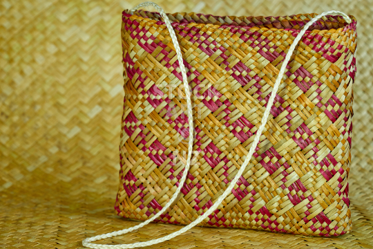 Kete whakairo with Papakirango pattern and white muka handles