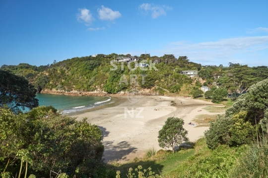 Little Oneroa Bay on Waiheke Island - Waihekes most popular swimming beach with holiday homes, an exclusive tourist destination off the Auckland coast in New Zealand