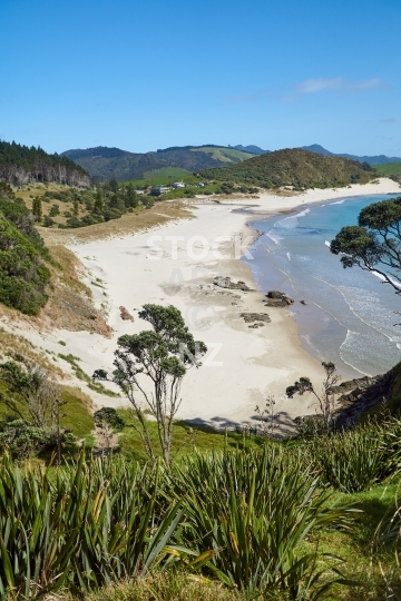 Lonely Ocean Beach and blue sky, Whangarei Heads, Northland