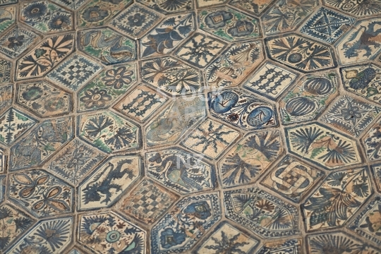 Medieval floor tiles - Caracciolo del Sole chapel of the ancient San Giovanni a Carbonara church in Napoli, Italy