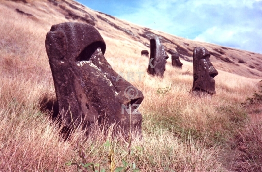 Moai statues in Rano Raraku, Easter Island - Vintage low resolution photo of the Moai standing lonely at the bottom of the volcano, Rapa Nui 1995