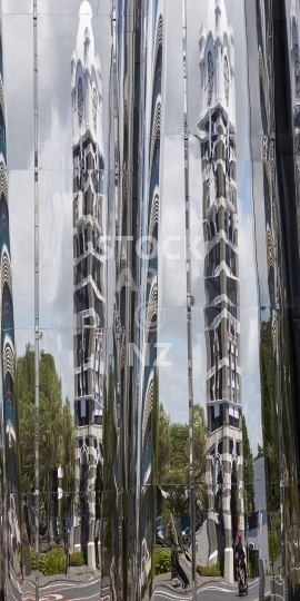 Mobile wallpaper: Abstract mirror reflection of the clock tower in New Plymouth, Taranaki - Kiwi themed phone background picture, screen size ratio 18:9 (or fitting anything between 16:9 - 20:9) - Len Lye Centre facade closeup