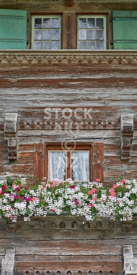 Mobile wallpaper: Closeup of a Swiss chalet