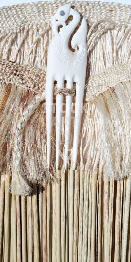 Mobile wallpaper: Maori art - white flax muka kahu with heru