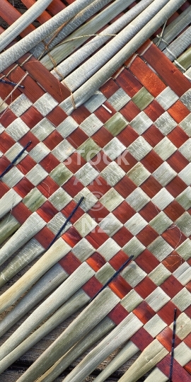 Mobile wallpaper: Unfinished New Zealand flax weaving in progress