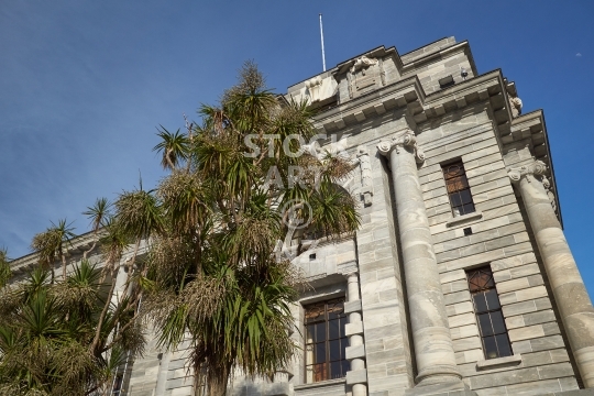 New Zealand government building - Wellington, New Zealand - With blue sky and a big Cabbage tree
