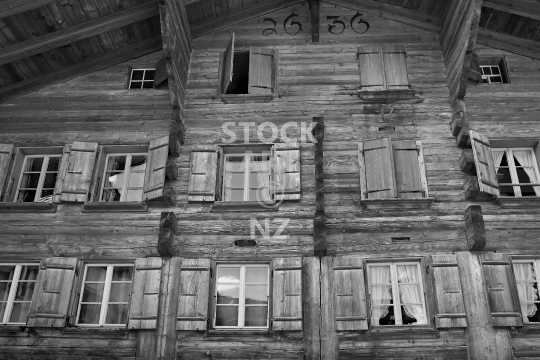 Old chalet - Saanen, Bernese Oberland, Switzerland - Black & white photo of the ancient wooden facade