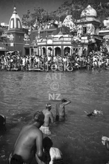 People bathing at the 1998 Kumbh Mela in Haridwar, India - Ritual bathing at the biggest Hindu festival with 25 million pilgrims - vintage low resolution black & white photo
