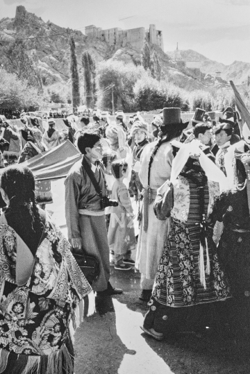 People wearing traditional Tibetan dress - Leh, Ladakh, India - Traditional costumes during a festival in 1994 - vintage low resolution black & white photo