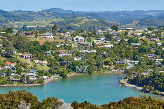 Picturesque Mill Bay with houses in Mangonui, Far North, Northland, New Zealand - View from Rangikapiti Pa lookout