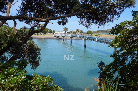 Raglan footbridge - Raglan, Waikato, NZ - View of the beautiful Te Kopua bridge connecting Raglan town with Kopua Recreation Reserve across the estuary