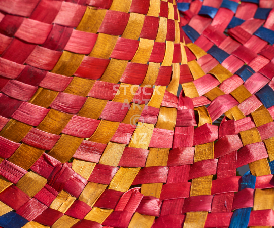 Splashback photo: Colourful NZ flax weaving hat - Kitchen splashback photo in red, yellow and blue colours for standard size 900 x 750 mm