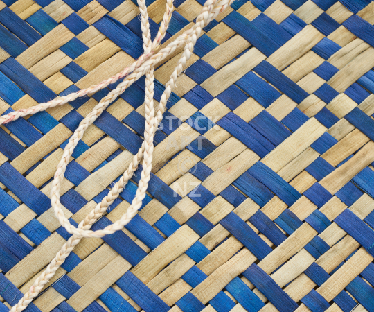 Splashback photo: Flax weaving kete up close