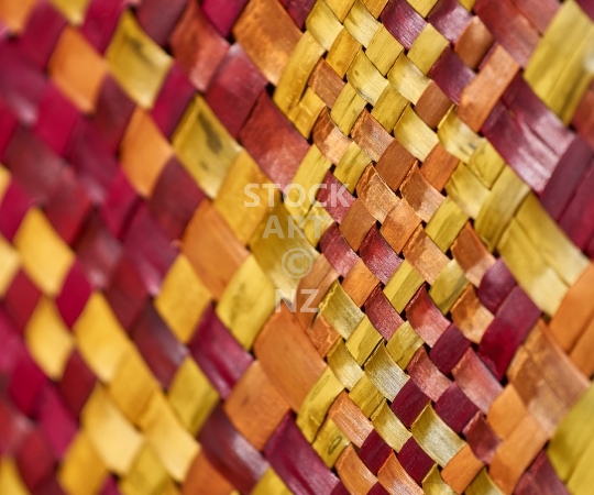 Splashback photo: red, orange and yellow NZ flax weaving - Kitchen splashback picture for standard size 900 x 750 mm