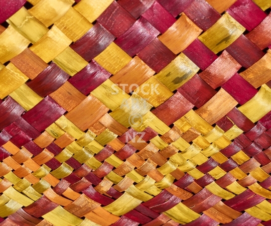 Splashback photo: red orange yellow flax weaving 