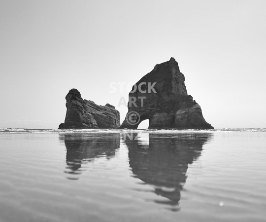 Splashback photo: Wharariki Beach rocks near Farewell Spit - Black & white kitchen splashback photo for standard size 900 x 750 mm