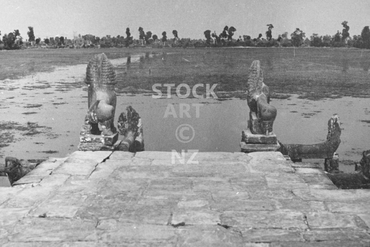 Srah Srang - Old 10th century ruins and newer landing pier with lions overlooking Baray Reservoir - black & white vintage low resolution photo from March 1992 