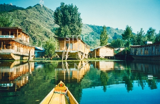 Srinagar house boats in 1994 - Dal Lake, Kashmir, India - Vintage low resolution photo of the famous floating lake hotels, waiting for tourists