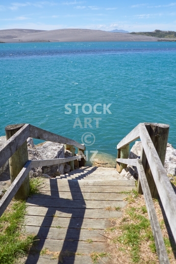 Steps into the water from Maukutea Beach in Aotea