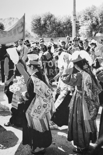 Traditional costumes - Leh, Ladakh, India - People wearing traditional Tibetan dress during a procession in 1994 - vintage low resolution black & white photo