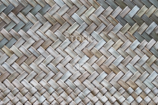 Traditional woven whariki mat - New Zealand flax weaving background