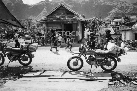 Travelling by Minsk motorbike in Vietnam - Street scene at a hill tribe village in the Lai Chau mountain region - old vintage low resolution photo